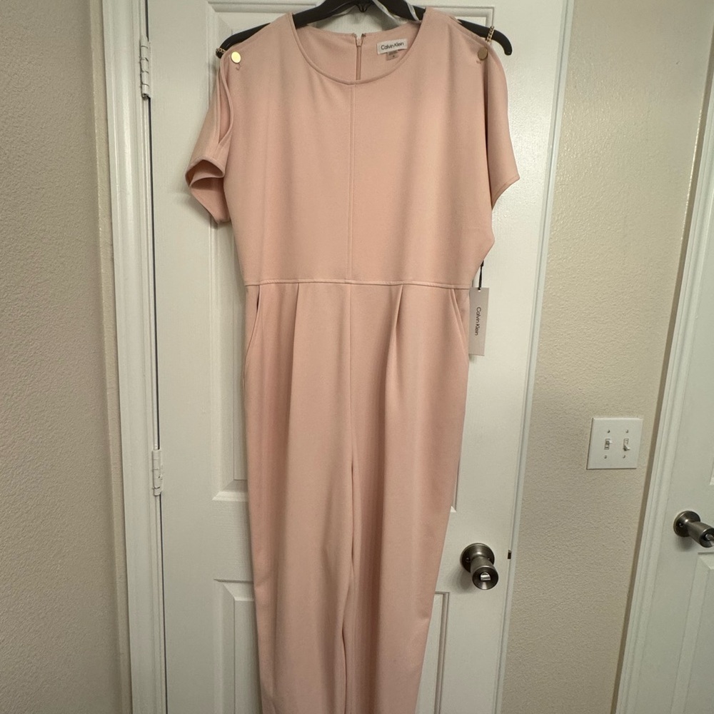 Calvin Klein Blush Cold-Shoulder Jumpsuit with gold details